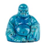 A Chinese blue monochrome glazed laughing Budai, marked, H 25 cm