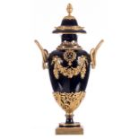 A Neoclassical ornamental vase in Sèvres with gold-layered blue royale ground colour and bronze
