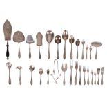 A 7-piece cutlery set and 10 extra pieces of cutlery, together with about 30 matching pieces of