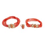 Two red coral bracelets with a 14ct gold lock; added a ditto ring with the central coral marquise