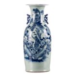 A Chinese celadon ground blue and white vase, decorated with a a monkey and a bird of prey on flower