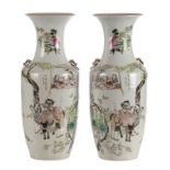 A pair of Chinese polychrome decorated vases with figures and a water buffalo, H 58 cm