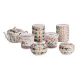 Six Chinese famille rose boxes and pots, decorated with figures, butterflies and flower branches;