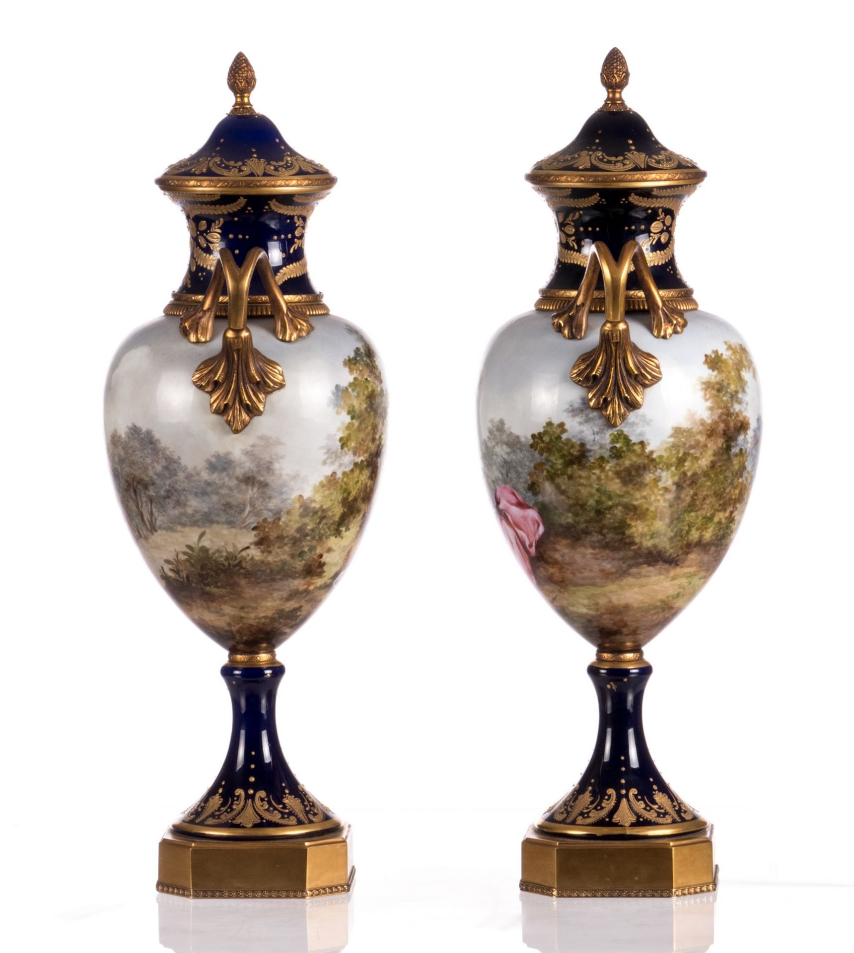 A pair of ornamental vases in Sèvres with gold-layered blue royale ground, decorated with a - Image 4 of 8