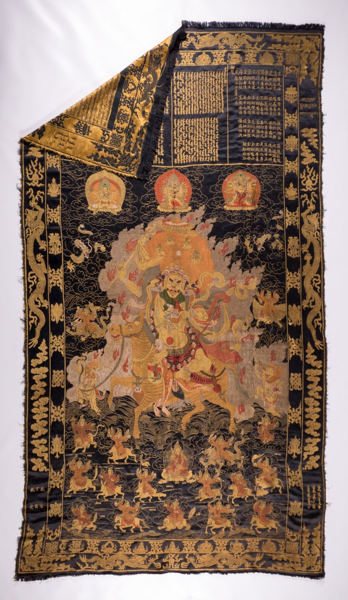 An extraordinary Chinese silk tapestry depicting scenes of a god, dragons and auspicious symbols - Image 2 of 14