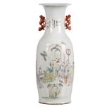 A Chinese polychrome vase, decorated with an animated scene, signed, H 61 cm