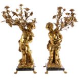 A pair of gilt bronze Historism candlesticks on a 'Vert de mer' marble base, style Nap. III, H
