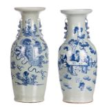 Two Chinese celadon ground blue and white decorated vases, one vase with Fu lions and one vase