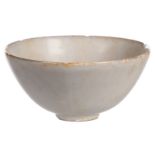 A Chinese celadon stoneware bowl, H 9,5 cm - Diameter 19,5 cm (chips, cracks and firing faults to