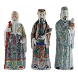 Three Chinese polychrome decorated 'Fu Lu Shou Xing' figures, marked, about 1900, H 57 - 62,5 cm