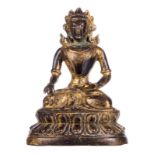 A Chinese gilt bronze Buddha, H 15 cm