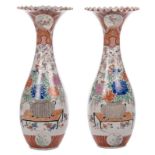 A pair of Japanese polychrome Arita vases, Meiji period, H 94 cm (restoration)