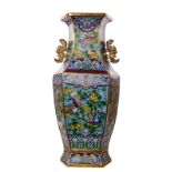 A Chinese hexagonal cloisonné vase, decorated with butterflies and floral motifs, ears relief