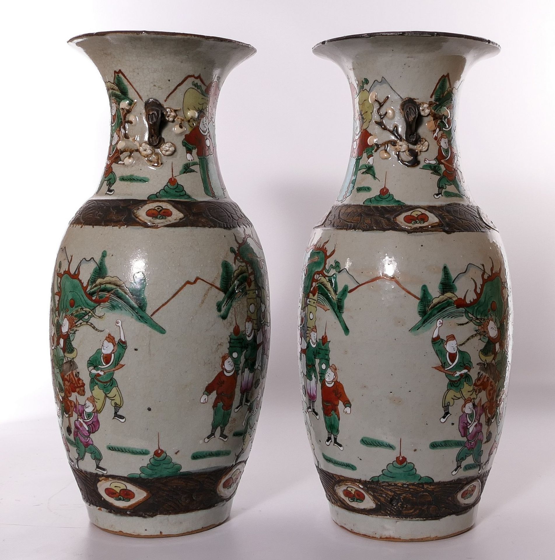 A pair of Chinese polychrome stoneware vases, decorated with warriors, marked, H 46 cm (restored) - Image 2 of 13