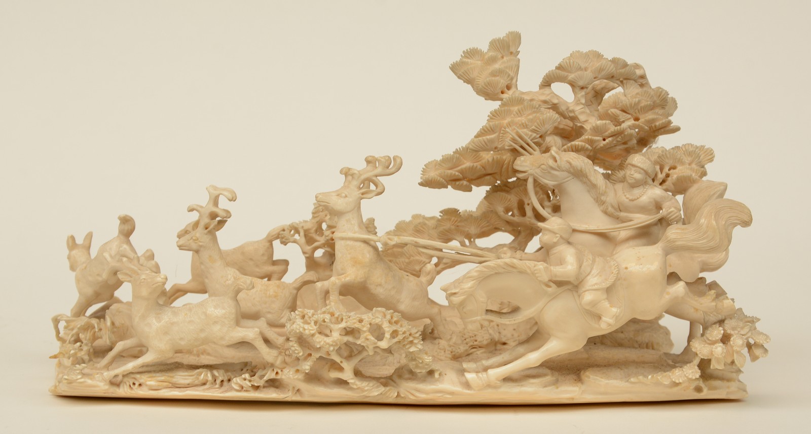 A Chinese ivory group depicting 'young heroes hunting for reindeers' on a carved wooden base, - Image 5 of 9