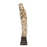 Our Lady with child, ivory sculpture (possibly mammoth) on an Gothic revival base, probably workshop