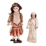 A Jumeau doll, about 1910; added a Simon & Halbig doll n°1159, about 1900