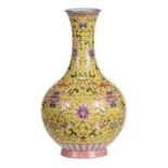 A Chinese yellow ground famille rose bottle vase, floral decorated with butterflies and bats, marked