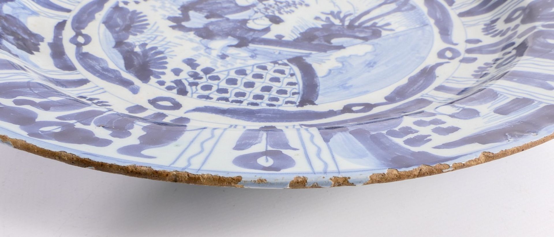 Two tin glazed and blue Wanli decorated Dutch Delftware plates, 17thC, (the usual glaze flaking to - Image 6 of 6