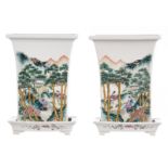 A pair of Chinese quadrangular famille rose and polychrome jardinières and matching plates,