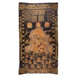 An extraordinary Chinese silk tapestry depicting scenes of a god, dragons and auspicious symbols