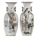 A pair of Chinese polychrome vases, decorated with figures in a cortege, H 57 - 58 cm (cracks to the