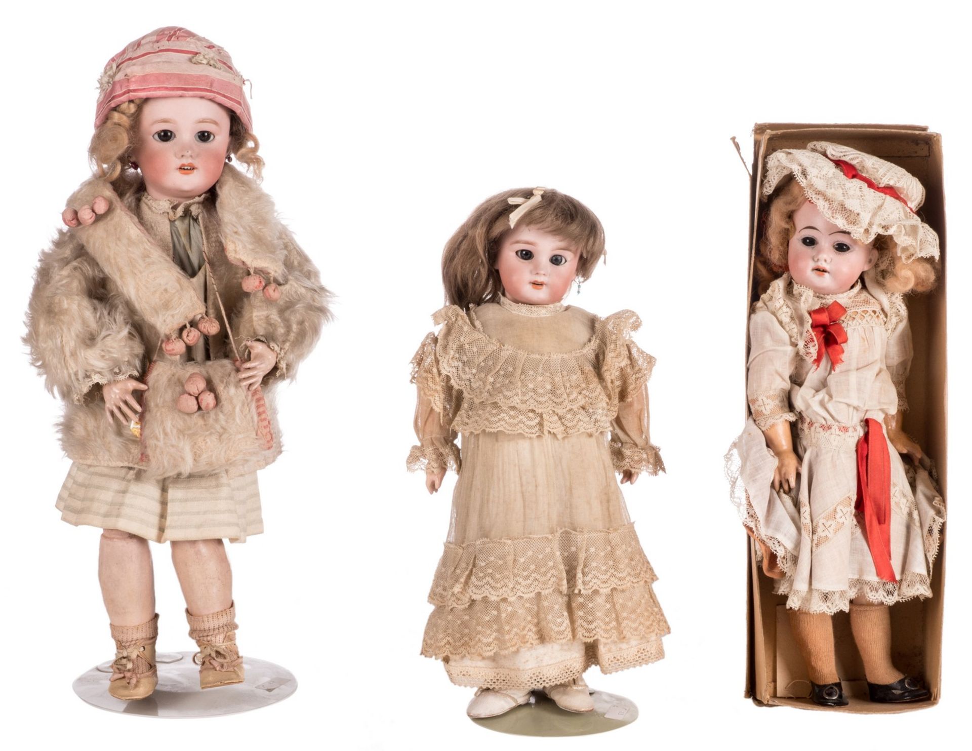 Three dolls: 'Bébé ideal', Armand Marseille 1894, with original clothing and box, about 1900;