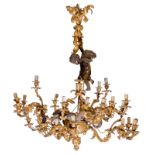 An exceptional rococo style gilt bronze and bronze chandelier, decorated with eagles and putto, H