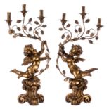 A pair of gilt wooden and brass baroque style candlesticks in the form of angels, H 80 cm (damage)