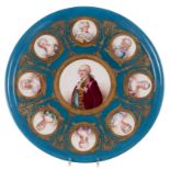 An ornamental plate depicting the French royal family (Ancien Régime), gold-layered bleu céleste