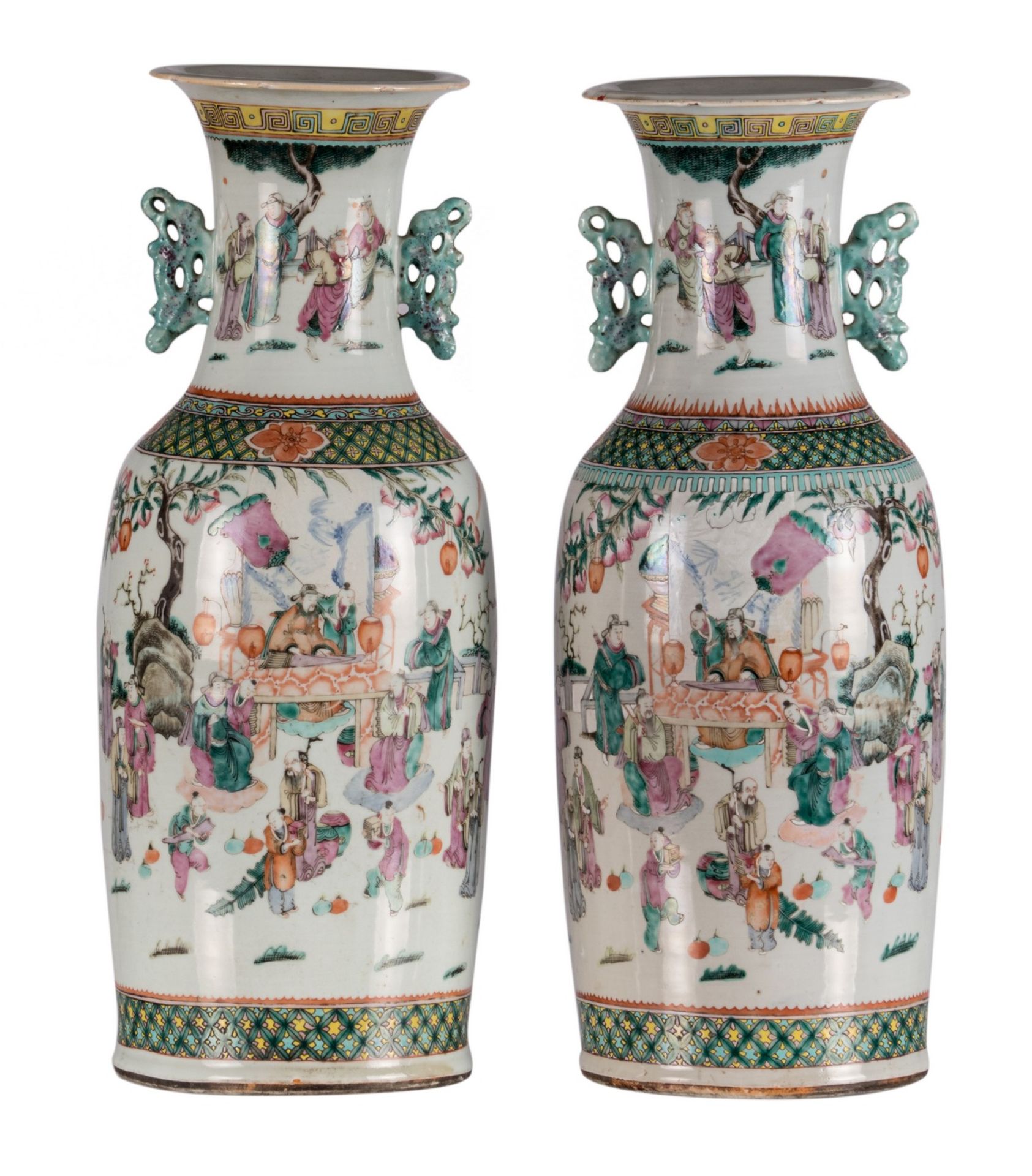 A pair of Chinese famille rose vases, overall decorated with a court scene on a terrace in a