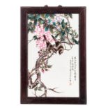 A Chinese famille rose plaque, decorated with birds on a flower branch, ca 1900, 29 x 43 cm (incl.