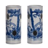 A pair of Chinese blue and white decorated hat stands with deer and a pine tree, 19thC, H 29 cm (