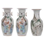 A pair of Chinese polychrome vases, decorated with scholars in a garden; added a ditto vase,