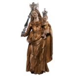 A gilt and polychrome decorated pinewood sculpture depicting Our Lady and Child, 17thC , crowns