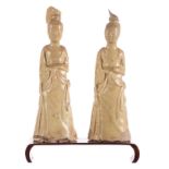 Two Han figurines in glazed pottery depicting court ladies, with pedestal in mahogany, China, H 27