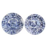 Two tin glazed and blue Wanli decorated Dutch Delftware plates, 17thC, (the usual glaze flaking to