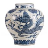 A Chinese blue and white dragon vase, marked, Qing dynasty, H 40,5 cm (cracks)