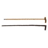An Oriental wooden walking stick with horn handle, about 1900; added a ditto bone walking stick, H