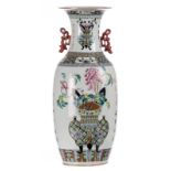 A Chinese famille rose vase, decorated with a flower basket and flower vases, 19thC, H 57,5 cm