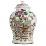 A Chinese famille rose vase and cover, decorated with antiquities and flower vases, marked, H 39,5