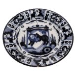 A blue and white decorated Dutch Delftware plate in the Wanli manner, depicting the Judah lion,