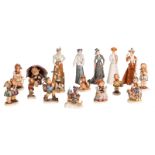 A large lot of Goebel and Hummel figurines, H 9 - 21,5 cm