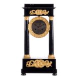 A third quarter of the 19thC French portico clock, ebonised walnut and pearwood with gilt bronze