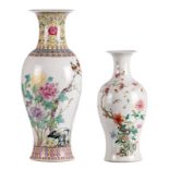 Two Chinese balluster shaped famille rose vases, one with birds on flower branches, one with