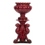 A French belle époque flambé red glazed jardiniere on base, H 106,5 cm