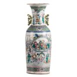 A Chinese famille rose and polychrome vase, overall decorated with immortals, 19thC, H 61,5 cm (