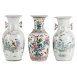 A Chinese famille rose vase decorated with cockerels, 19thC; added two ditto vases decorated with