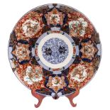 An impressive Japanese Imari plate, late Edo period, mid 19thC, Diameter 61,8 cm