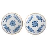 Two 18thC tin glazed and blue decorated Dutch Delftware plates, marked 'De Byl', (the usual glaze